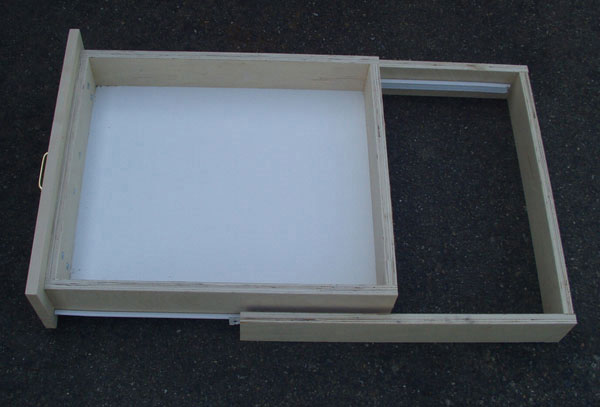 detail of drawer box and slide frame on bench