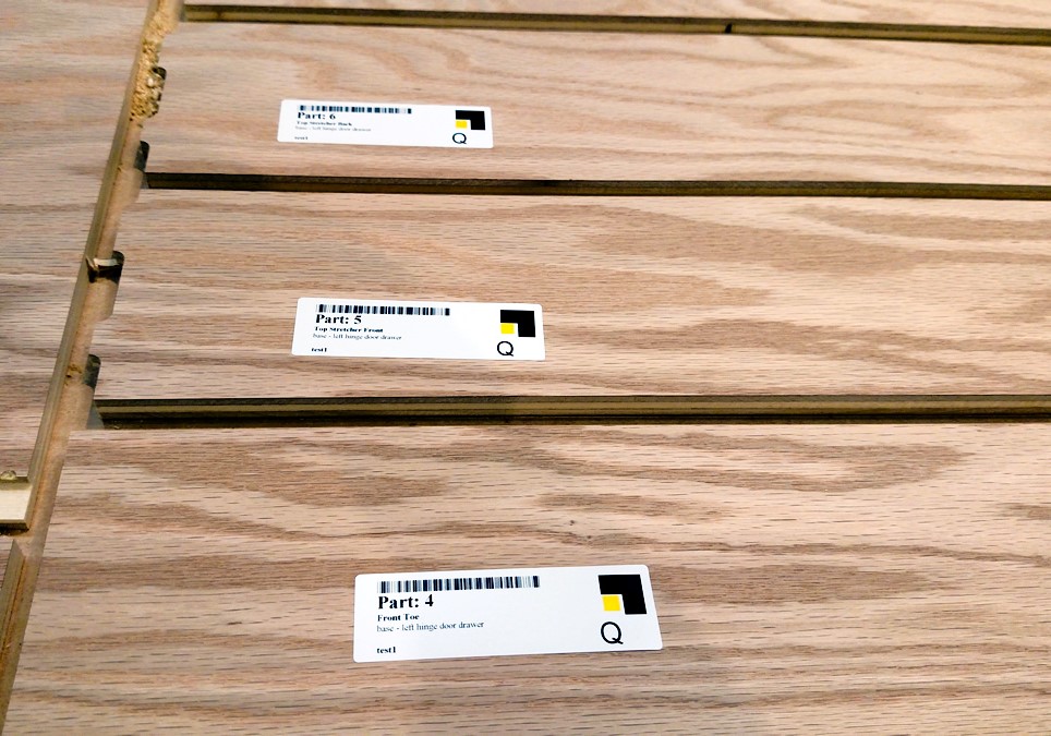 Sheet of color-coded part labels printed by the Thermwood Cut Center
